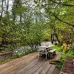 Whome Riverfront Retreat With Exclusive Waterfall Views Alpesi faház Baião